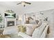 Spacious living room with fireplace, plush seating, and views into main bedroom at 625 St Annes Pl, Covington, GA 30016