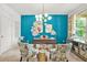 Bright home office with a striking accent wall and elegant decor at 625 St Annes Pl, Covington, GA 30016