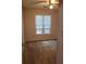 A bedroom featuring neutral carpet, a window for natural light, and light wall paint at 1034 Bettina Sw Ct, Mableton, GA 30126