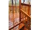 Freshly stained wood deck and railing with a view of the backyard at 1034 Bettina Sw Ct, Mableton, GA 30126