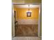 A dining room with yellow walls, white trim, carpeted floor, and decorative chandelier at 1034 Bettina Sw Ct, Mableton, GA 30126