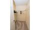 Walk-in closet featuring ample storage shelves and neutral carpeting at 7030 Wessex Way, Cumming, GA 30028