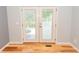 A close up view of bright double doors that lead to an outdoor deck at 7030 Wessex Way, Cumming, GA 30028