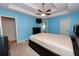 Spacious main bedroom with modern ceiling fan and ample closet space at 7030 Wessex Way, Cumming, GA 30028