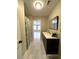 Stylish bathroom featuring a vanity with a dark finish, tile floors, and a shower with curtain at 1929 Hazelwood Se Dr, Marietta, GA 30067