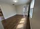Sun-drenched living room featuring hardwood floors and neutral paint, ready for your personal touch at 1929 Hazelwood Se Dr, Marietta, GA 30067