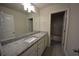 Bathroom featuring granite countertops, a sink, and a doorway leading to the tub at 2504 Bear Mountain St, Lithonia, GA 30058