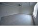 Expansive bedroom with plush carpeting, tray ceiling and large window at 2504 Bear Mountain St, Lithonia, GA 30058