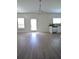 Kitchen boasts modern lighting and a stainless steel dishwasher at 2504 Bear Mountain St, Lithonia, GA 30058