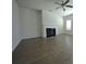 Living room features a fireplace and hardwood flooring at 2504 Bear Mountain St, Lithonia, GA 30058