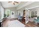 Bright living space features high ceilings, hardwood floors, lots of natural light, and a charming office nook at 312 Laurel Run Cv, Sugar Hill, GA 30518