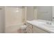 Bathroom featuring a tub with shower, toilet, and vanity with a sink at 4116 Wendell Way, Snellville, GA 30039
