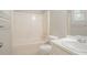 Bathroom featuring a tub with shower, toilet, and vanity with a sink at 4116 Wendell Way, Snellville, GA 30039