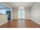 Dining room with chair rail molding and views of the yard through double doors at 4116 Wendell Way, Snellville, GA 30039