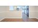 Open kitchen featuring white cabinets and stainless steel appliances at 4116 Wendell Way, Snellville, GA 30039