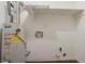 Utility room featuring a hot water heater and washer and dryer hookups at 4116 Wendell Way, Snellville, GA 30039