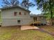 Backyard featuring a patio area and a newly installed deck at 8272 Magnolia Dr, Jonesboro, GA 30238