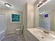 Clean bathroom featuring a shower/tub combination and a modern vanity at 8272 Magnolia Dr, Jonesboro, GA 30238