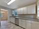 Modern kitchen featuring stainless steel appliances, granite countertops, and ample cabinet space at 8272 Magnolia Dr, Jonesboro, GA 30238