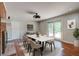 Elegant dining area with a modern table, stylish seating, and sliding glass doors offering natural light at 1840 Linwood Ave, Atlanta, GA 30344