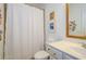 Cozy bathroom with a shower-tub combo, vanity with drawers, and white walls at 2535 Castlerock Ct, Cumming, GA 30041