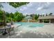 Large community pool with splash pad and comfortable seating areas at 2535 Castlerock Ct, Cumming, GA 30041