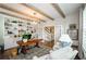 Spacious home office with hardwood floors, built-in bookshelves, and French doors at 2535 Castlerock Ct, Cumming, GA 30041