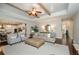 Open-concept living room flowing into a modern kitchen with ample seating at 2535 Castlerock Ct, Cumming, GA 30041