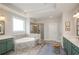 Bright bathroom featuring a large soaking tub, tiled shower, and double sink vanity at 2535 Castlerock Ct, Cumming, GA 30041