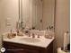 Bathroom featuring a vanity with a white countertop and ample counter space at 1292 Hidden Spirit Trl, Lawrenceville, GA 30045
