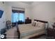 Comfortable bedroom with a work desk and plenty of natural light at 1292 Hidden Spirit Trl, Lawrenceville, GA 30045