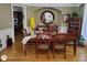 Inviting dining room with a large wooden table, classic chairs, and stylish decor at 1292 Hidden Spirit Trl, Lawrenceville, GA 30045
