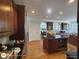 Spacious kitchen with hardwood floors, granite counters, and a large central island at 1292 Hidden Spirit Trl, Lawrenceville, GA 30045