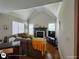Relaxing living room with hardwood floors, a fireplace, and natural light at 1292 Hidden Spirit Trl, Lawrenceville, GA 30045