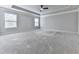 Spacious bedroom featuring carpet, ceiling fan and large windows at 212 Torch Dr, Acworth, GA 30102