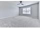Bedroom featuring carpet and large window for natural light at 212 Torch Dr, Acworth, GA 30102