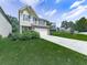 Two-story home with manicured lawn, stone accents, and inviting curb appeal at 212 Torch Dr, Acworth, GA 30102