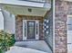 Charming front porch featuring stone accents, and decorative flowerpots at 212 Torch Dr, Acworth, GA 30102
