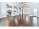 Open-concept living area with hardwood floors and ample natural light at 212 Torch Dr, Acworth, GA 30102