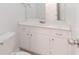 Small bathroom featuring a white vanity with sink and mirror at 1240 Rocky Rd, Lawrenceville, GA 30044