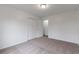 This bedroom features soft carpeting and a closet for storing all your clothes and items at 1240 Rocky Rd, Lawrenceville, GA 30044