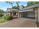 Attached two-car garage with an open door, providing ample parking space at 1240 Rocky Rd, Lawrenceville, GA 30044