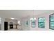 Bright kitchen and breakfast area with lots of natural light and modern appliances at 1240 Rocky Rd, Lawrenceville, GA 30044