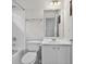 Clean bathroom features a shower/tub combo, white cabinetry, and modern fixtures at 2002 Ivy Ridge Se Rd, Smyrna, GA 30080