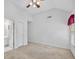 Bright bedroom with ensuite bath, vaulted ceiling, and neutral carpet at 2002 Ivy Ridge Se Rd, Smyrna, GA 30080