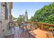 Cozy wooden deck with outdoor furniture, perfect for relaxing and entertaining at 2002 Ivy Ridge Se Rd, Smyrna, GA 30080