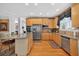 Spacious kitchen featuring stainless steel appliances and an island with seating at 2002 Ivy Ridge Se Rd, Smyrna, GA 30080