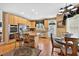 Kitchen with stainless steel appliances, island with seating, and sunlit breakfast nook at 2002 Ivy Ridge Se Rd, Smyrna, GA 30080