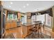Bright kitchen featuring stainless steel appliances, tile backsplash, and an island with seating at 2002 Ivy Ridge Se Rd, Smyrna, GA 30080