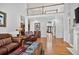 Spacious living room with hardwood floors, a fireplace, and open floor plan at 2002 Ivy Ridge Se Rd, Smyrna, GA 30080